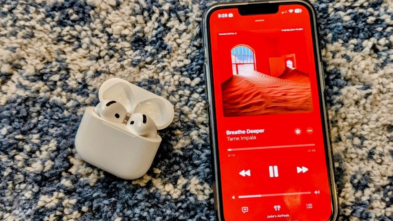 AirPods 4 with an iPhone playing Apple Music