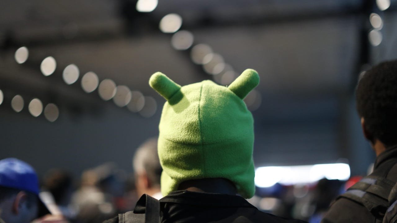 person with Android hat on