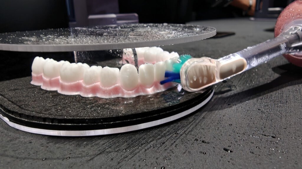 I flossed fake teeth with Dyson's tech-riddled CameraJet toothbrush
